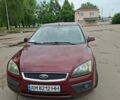 Червоний Форд Фокус, об'ємом двигуна 2 л та пробігом 302 тис. км за 4300 $, фото 1 на Automoto.ua
