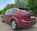 Красный Форд Фокус, объемом двигателя 2 л и пробегом 302 тыс. км за 4300 $, фото 5 на Automoto.ua