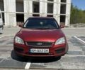 Красный Форд Фокус, объемом двигателя 1.6 л и пробегом 320 тыс. км за 2999 $, фото 1 на Automoto.ua