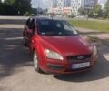Красный Форд Фокус, объемом двигателя 1.39 л и пробегом 323 тыс. км за 3100 $, фото 1 на Automoto.ua