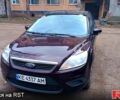 Красный Форд Фокус, объемом двигателя 1.6 л и пробегом 256 тыс. км за 5600 $, фото 1 на Automoto.ua