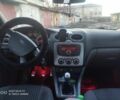 Червоний Форд Фокус, об'ємом двигуна 1.4 л та пробігом 157 тис. км за 5521 $, фото 7 на Automoto.ua