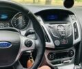 Червоний Форд Фокус, об'ємом двигуна 1.6 л та пробігом 150 тис. км за 8892 $, фото 16 на Automoto.ua