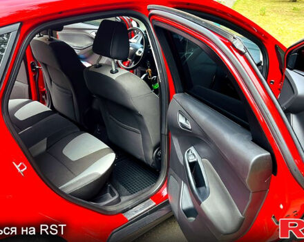 Червоний Форд Фокус, об'ємом двигуна 1.6 л та пробігом 150 тис. км за 7900 $, фото 12 на Automoto.ua