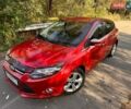 Красный Форд Фокус, объемом двигателя 1.6 л и пробегом 139 тыс. км за 5900 $, фото 1 на Automoto.ua