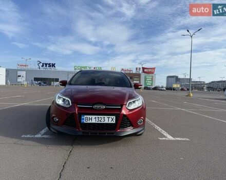 Красный Форд Фокус, объемом двигателя 2 л и пробегом 180 тыс. км за 6850 $, фото 1 на Automoto.ua