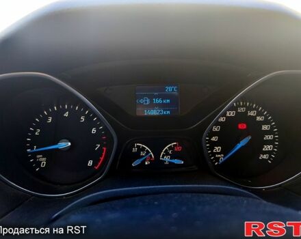 Красный Форд Фокус, объемом двигателя 1 л и пробегом 140 тыс. км за 7000 $, фото 3 на Automoto.ua