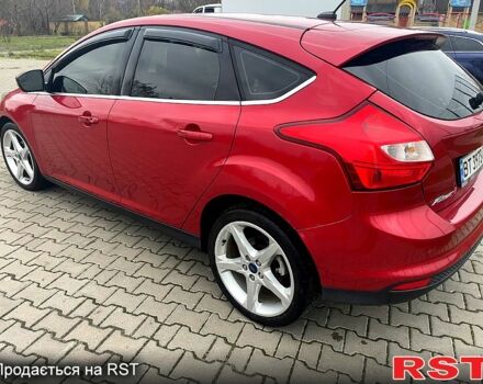 Красный Форд Фокус, объемом двигателя 2 л и пробегом 135 тыс. км за 8100 $, фото 1 на Automoto.ua