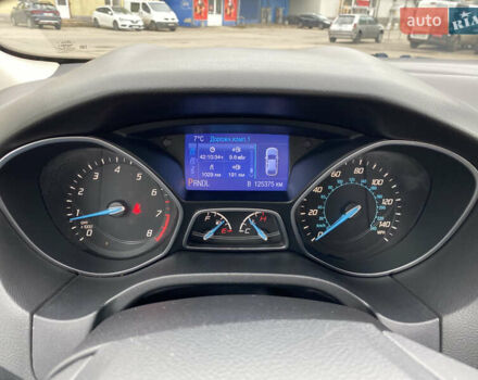 Красный Форд Фокус, объемом двигателя 2 л и пробегом 125 тыс. км за 7500 $, фото 6 на Automoto.ua