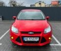 Красный Форд Фокус, объемом двигателя 1.6 л и пробегом 138 тыс. км за 7300 $, фото 1 на Automoto.ua