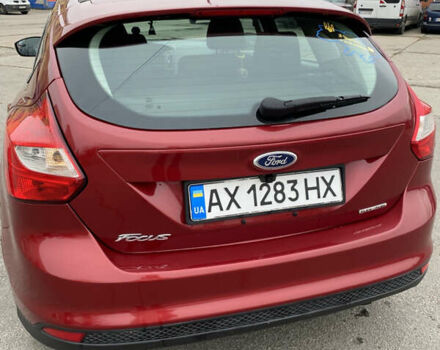 Красный Форд Фокус, объемом двигателя 2 л и пробегом 125 тыс. км за 7500 $, фото 2 на Automoto.ua