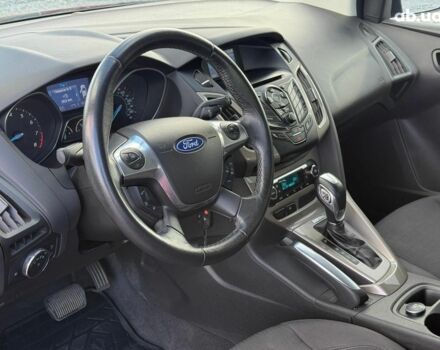 Красный Форд Фокус, объемом двигателя 2 л и пробегом 161 тыс. км за 7990 $, фото 14 на Automoto.ua