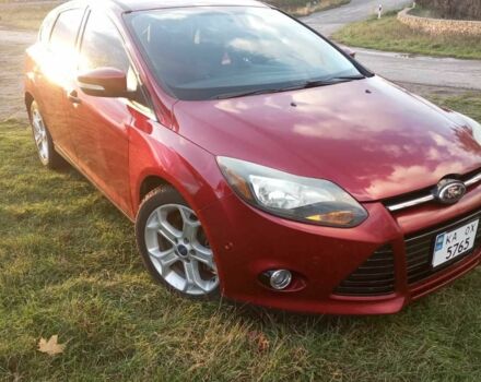Красный Форд Фокус, объемом двигателя 2 л и пробегом 120 тыс. км за 8000 $, фото 1 на Automoto.ua