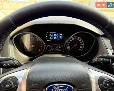Красный Форд Фокус, объемом двигателя 1 л и пробегом 209 тыс. км за 6700 $, фото 1 на Automoto.ua