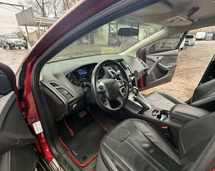 Красный Форд Фокус, объемом двигателя 2 л и пробегом 115 тыс. км за 8600 $, фото 4 на Automoto.ua