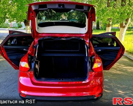 Червоний Форд Фокус, об'ємом двигуна 1 л та пробігом 78 тис. км за 8870 $, фото 9 на Automoto.ua