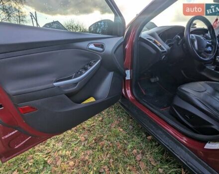 Червоний Форд Фокус, об'ємом двигуна 2 л та пробігом 120 тис. км за 7999 $, фото 18 на Automoto.ua