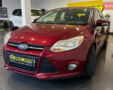 Червоний Форд Фокус, об'ємом двигуна 2 л та пробігом 171 тис. км за 8599 $, фото 2 на Automoto.ua