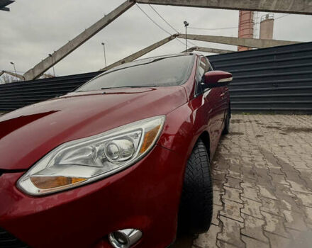 Красный Форд Фокус, объемом двигателя 2 л и пробегом 115 тыс. км за 8600 $, фото 1 на Automoto.ua