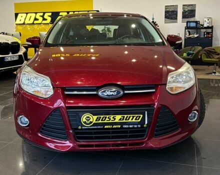 Червоний Форд Фокус, об'ємом двигуна 2 л та пробігом 171 тис. км за 8599 $, фото 1 на Automoto.ua