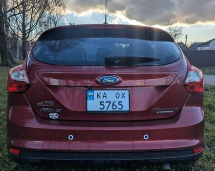 Червоний Форд Фокус, об'ємом двигуна 2 л та пробігом 120 тис. км за 7999 $, фото 5 на Automoto.ua