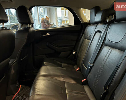 Червоний Форд Фокус, об'ємом двигуна 2 л та пробігом 171 тис. км за 8599 $, фото 18 на Automoto.ua