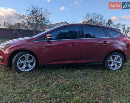 Червоний Форд Фокус, об'ємом двигуна 2 л та пробігом 120 тис. км за 7999 $, фото 3 на Automoto.ua