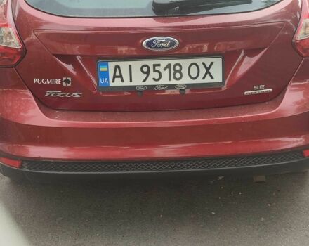 Форд Фокус 2013 в Тараще на Automoto.ua Красный Форд Фокус, объемом двигателя 2 л и пробегом 197 тыс. км за 6500 $, фото 1 на Automoto.ua