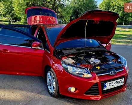 Форд Фокус 2013 в Харькове на Automoto.ua Красный Форд Фокус, объемом двигателя 1 л и пробегом 85 тыс. км за 8470 $, фото 48 на Automoto.ua