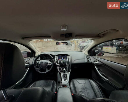 Красный Форд Фокус, объемом двигателя 2 л и пробегом 115 тыс. км за 8600 $, фото 6 на Automoto.ua