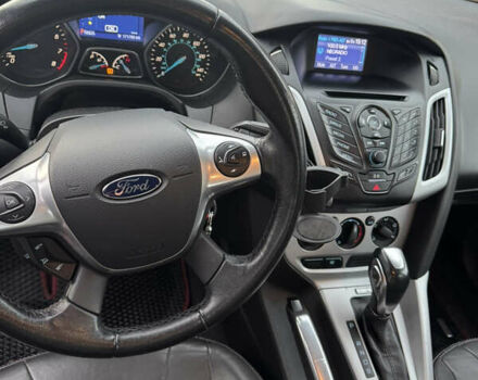 Красный Форд Фокус, объемом двигателя 2 л и пробегом 171 тыс. км за 8300 $, фото 1 на Automoto.ua