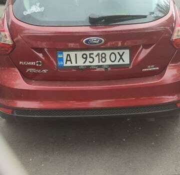 Червоний Форд Фокус, об'ємом двигуна 2 л та пробігом 215 тис. км за 7000 $, фото 1 на Automoto.ua