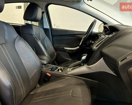 Червоний Форд Фокус, об'ємом двигуна 2 л та пробігом 171 тис. км за 8599 $, фото 20 на Automoto.ua