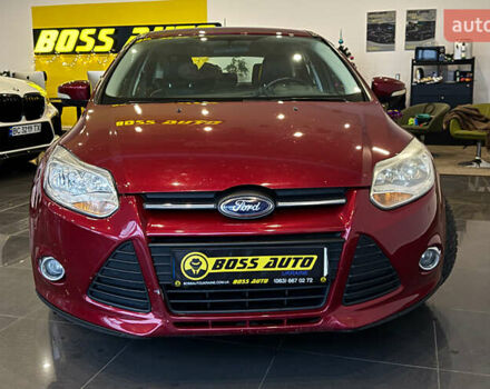 Червоний Форд Фокус, об'ємом двигуна 2 л та пробігом 171 тис. км за 8599 $, фото 1 на Automoto.ua