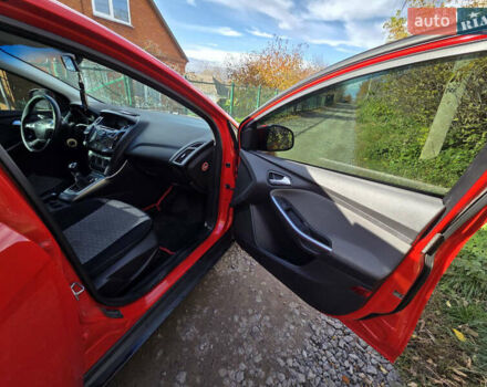 Форд Фокус 2013 в Хмельницком на Automoto.ua Красный Форд Фокус, объемом двигателя 1 л и пробегом 143 тыс. км за 7300 $, фото 14 на Automoto.ua