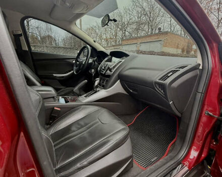 Красный Форд Фокус, объемом двигателя 2 л и пробегом 115 тыс. км за 8600 $, фото 2 на Automoto.ua