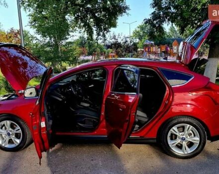 Форд Фокус 2013 в Харькове на Automoto.ua Красный Форд Фокус, объемом двигателя 1 л и пробегом 85 тыс. км за 8470 $, фото 47 на Automoto.ua