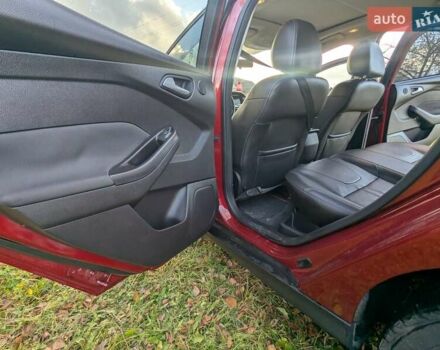 Червоний Форд Фокус, об'ємом двигуна 2 л та пробігом 120 тис. км за 7999 $, фото 16 на Automoto.ua