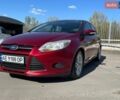 Красный Форд Фокус, объемом двигателя 2 л и пробегом 185 тыс. км за 6600 $, фото 1 на Automoto.ua