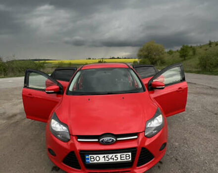 Красный Форд Фокус, объемом двигателя 2 л и пробегом 205 тыс. км за 6999 $, фото 4 на Automoto.ua