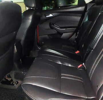 Червоний Форд Фокус, об'ємом двигуна 2 л та пробігом 206 тис. км за 8300 $, фото 9 на Automoto.ua