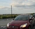 Червоний Форд Фокус, об'ємом двигуна 2 л та пробігом 205 тис. км за 7350 $, фото 1 на Automoto.ua