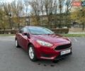 Красный Форд Фокус, объемом двигателя 2 л и пробегом 206 тыс. км за 8500 $, фото 1 на Automoto.ua