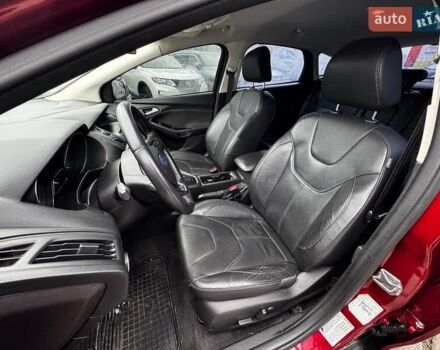 Червоний Форд Фокус, об'ємом двигуна 2 л та пробігом 106 тис. км за 8990 $, фото 9 на Automoto.ua