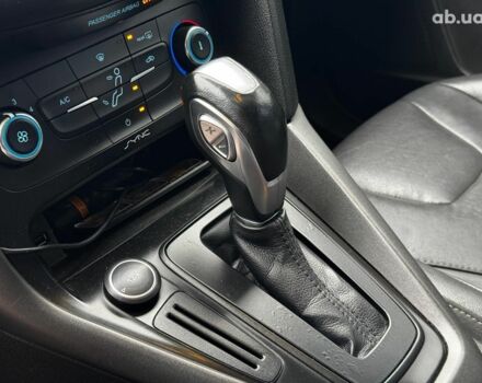 Червоний Форд Фокус, об'ємом двигуна 2 л та пробігом 106 тис. км за 8990 $, фото 12 на Automoto.ua