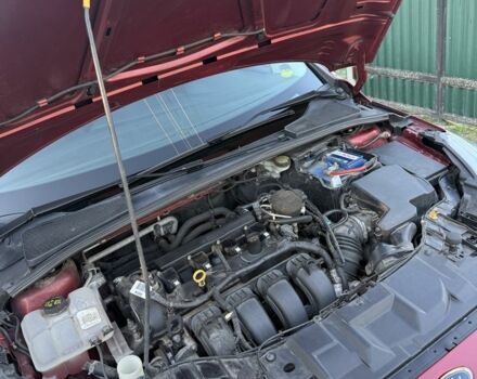 Красный Форд Фокус, объемом двигателя 2 л и пробегом 151 тыс. км за 7300 $, фото 6 на Automoto.ua