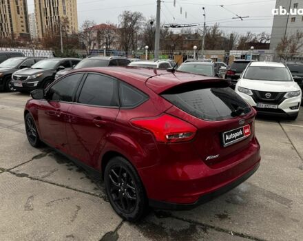 Червоний Форд Фокус, об'ємом двигуна 2 л та пробігом 106 тис. км за 8990 $, фото 4 на Automoto.ua