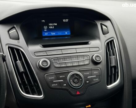 Червоний Форд Фокус, об'ємом двигуна 2 л та пробігом 106 тис. км за 8990 $, фото 14 на Automoto.ua