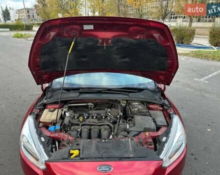 Красный Форд Фокус, объемом двигателя 2 л и пробегом 206 тыс. км за 8500 $, фото 12 на Automoto.ua