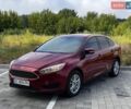 Красный Форд Фокус, объемом двигателя 2 л и пробегом 180 тыс. км за 7350 $, фото 1 на Automoto.ua
